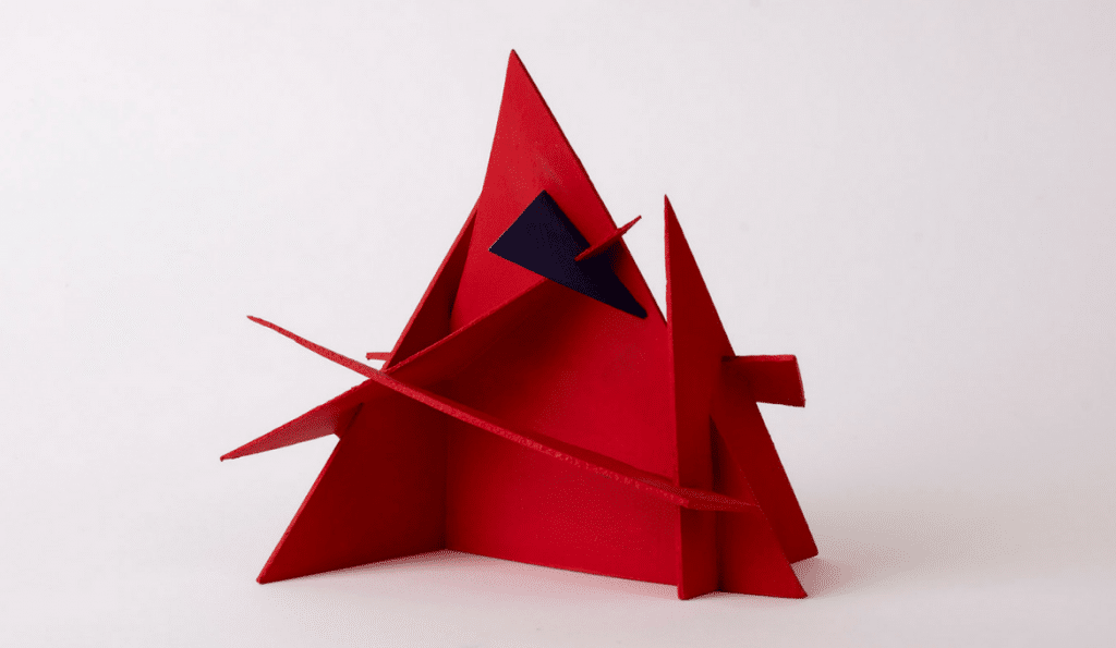 A photo of a red origami shape.