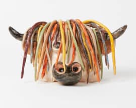 A sculpture of a cow head.