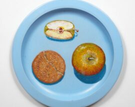 A painting of a plate with apples and a biscuit on it.