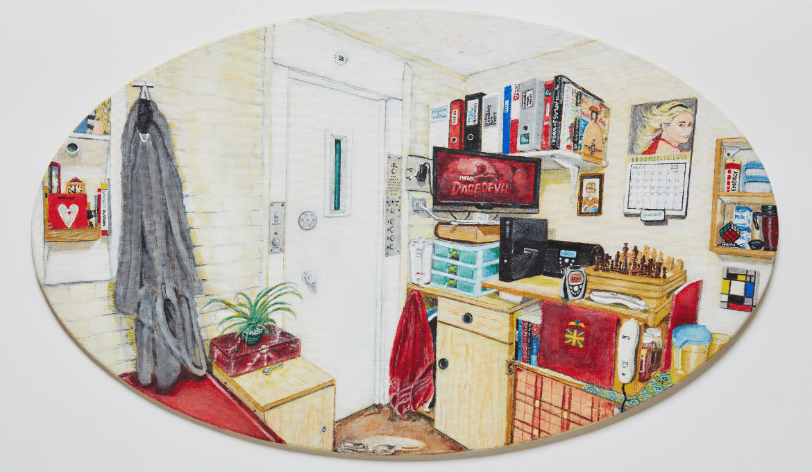 A photo of an oval shaped painting of a front door with lots of cupboards and storage around.